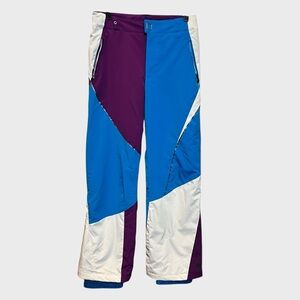 Spyder Girls multi- color ski snow pants with grow cuffs.